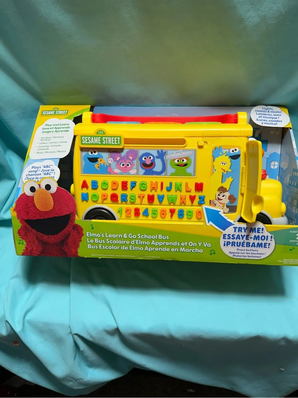 Sesame Street Yellow Learn & Go School Bus Toy with Red Handle